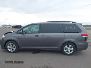 2011 Toyota Sienna LE AAS with VIN 5TDKK3DC3BS077857, listed as a IAAI auction lot 42099175 with 283,777 mi miles and . Bid and sale history available at DreamBid. Image 14.