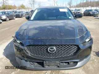 2022 Mazda CX-30 S with VIN 3MVDMBALXNM402265, listed as a IAAI auction lot 41458605 with 76,291 mi miles and . Bid and sale history available at carsss.com. Image 12.