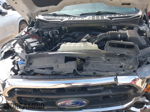 2023 Ford F-150 XL with VIN 1FTMF1C53PKF34184, listed as a IAAI auction lot 42242703 with 27,312 mi miles and . Bid and sale history available at DreamBid. Image 10.