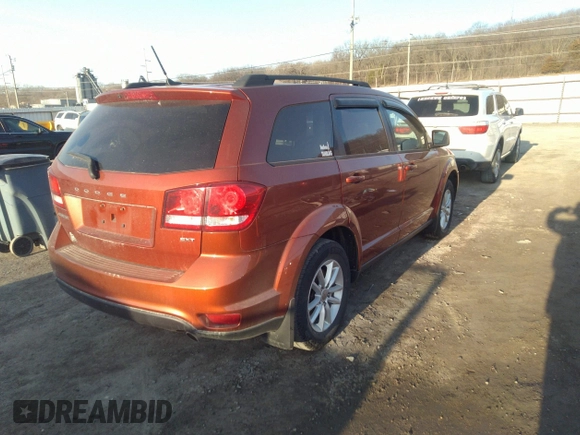 2013 Dodge Journey SXT with VIN 3C4PDCBG4DT659738, listed as a IAAI auction lot 41777689 with 165,050 mi miles. Bid and sale history available at carsss.com. Image 4.