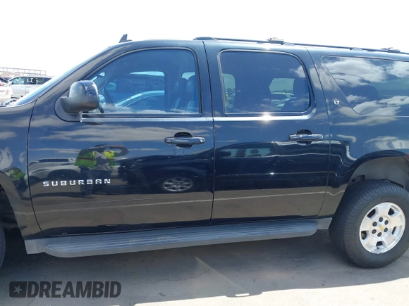 2012 Chevrolet Suburban LT with VIN 1GNSCJE00CR226285, listed as a IAAI auction lot 42059936 with 318,948 mi miles and . Bid and sale history available at DreamBid. Image 14.