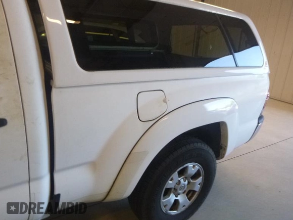 2013 Toyota Tacoma with VIN 3TMMU4FN6DM062201, listed as a IAAI auction lot 42906789 with 266,431 mi miles and . Bid and sale history available at DreamBid. Image 14.