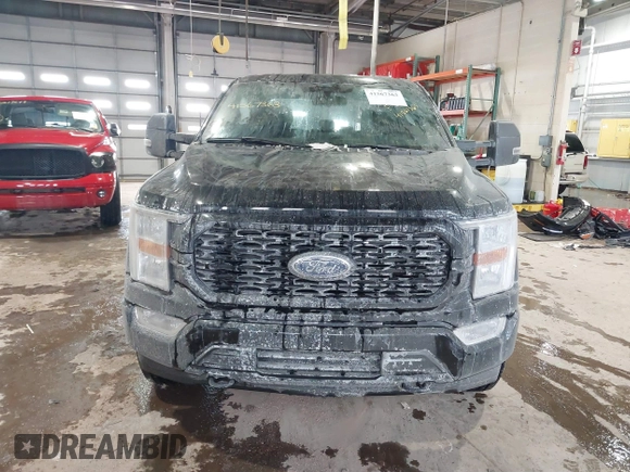 2021 Ford F-150 XL with VIN 1FTFW1E56MFC60361, listed as a IAAI auction lot 41567363 with 31,092 mi miles and . Bid and sale history available at DreamBid. Image 12.