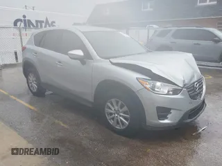 2016 Mazda CX-5 Sport with VIN JM3KE2BY7G0906320, listed as a IAAI auction lot 42425165 with 143,645 mi miles and . Bid and sale history available at DreamBid. Image 1.