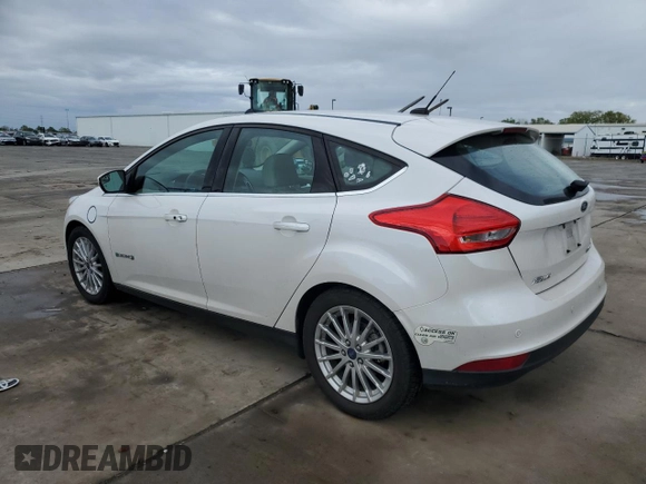 2015 Ford Focus Electric z VIN 1FADP3R46FL288088, wystawiony jako Copart lot #51020475 z przebiegiem 64 928 mil mil oraz Czysty tytuł • Clean title. Historia ofert i sprzedaży dostępna na DreamBid. Obrazek 2.