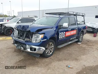 2018 Nissan Titan SV with VIN 1N6AA1E69JN500096, listed as a IAAI auction lot 41883390 with 136,752 mi miles and . Bid and sale history available at DreamBid. Image 19.