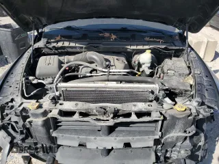 2014 Ram 1500 Tradesman z VIN 3C6JR7AT4EG325188, wystawiony jako Copart lot #48814145 z przebiegiem 156 409 mil mil oraz Szkoda całkowita • Salvage title. Historia ofert i sprzedaży dostępna na DreamBid. Obrazek 11.