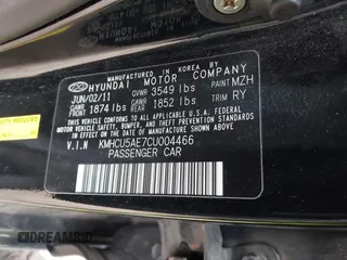 2012 Hyundai Accent SE with VIN KMHCU5AE7CU004466, listed as a IAAI auction lot 41602472 with 144,843 mi miles. Bid and sale history available at carsss.com. Image 9.