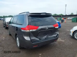 2014 Toyota Sienna XLE with VIN 5TDYK3DC0ES496716, listed as a IAAI auction lot 42494549 with 158,645 mi miles and . Bid and sale history available at DreamBid. Image 6.