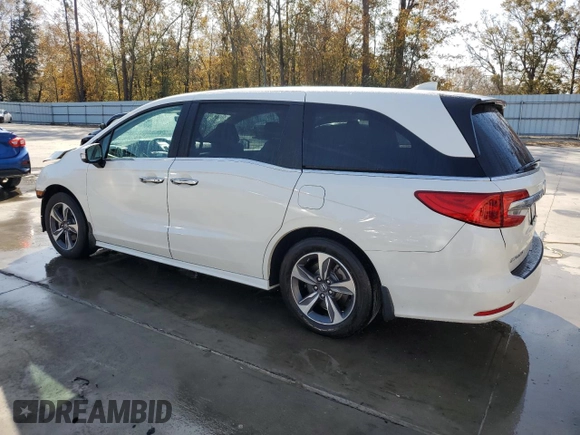 2019 Honda Odyssey Touring with VIN 5FNRL6H89KB064683, listed as a Copart auction lot 84063114 with 71,919 mi miles and Salvage Title. Bid and sale history available at carsss.com. Image 2.