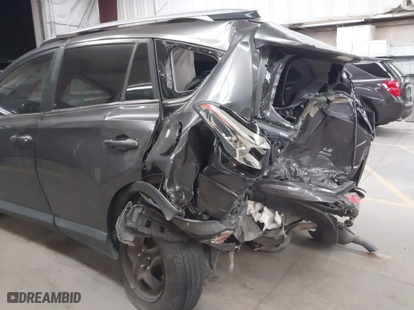 2017 Toyota RAV4 LE with VIN JTMBFREV9HJ132888, listed as a IAAI auction lot 41946329 with 100,982 mi miles. Bid and sale history available at carsss.com. Image 6.