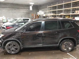 2020 Honda Passport EX-L with VIN 5FNYF8H53LB013931, listed as a IAAI auction lot 41614095 with 68,537 mi miles and . Bid and sale history available at DreamBid. Image 14.