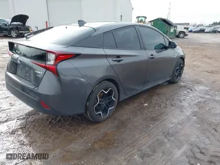2020 Toyota Prius L Eco with VIN JTDKARFU5L3117919, listed as a IAAI auction lot 41686815 with 154,128 mi miles. Bid and sale history available at carsss.com. Image 4.