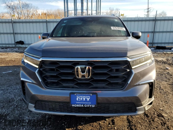 2025 Honda Pilot EX-L with VIN 5FNYG1H44SB063991, listed as a Copart auction lot 47678335 with 5 mi miles and Salvage title. Bid and sale history available at DreamBid. Image 5.