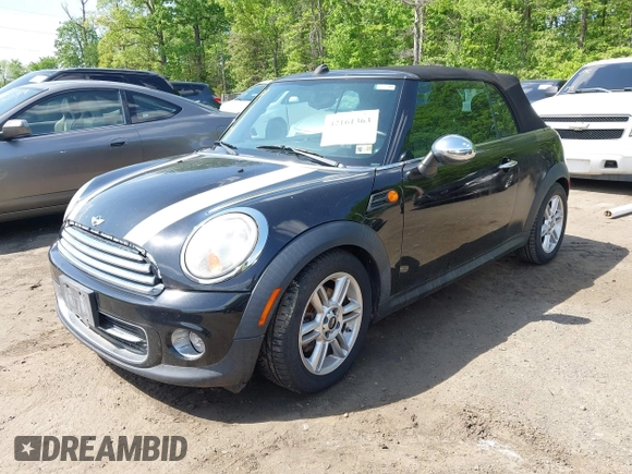 2011 MINI Convertible with VIN WMWZN3C56BT132924, listed as a IAAI auction lot 42161363 with 133,444 mi miles and . Bid and sale history available at DreamBid. Image 2.