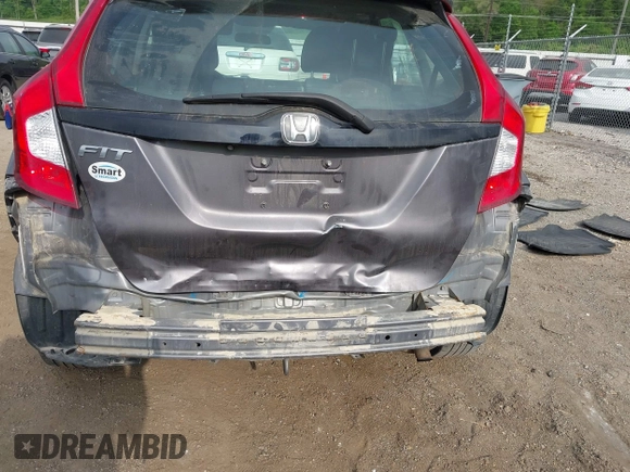 2015 Honda Fit LX with VIN 3HGGK5H58FM722880, listed as a IAAI auction lot 42276261 with 104,886 mi miles and . Bid and sale history available at DreamBid. Image 6.