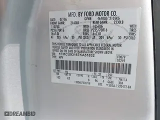 2007 Ford Escape XLT with VIN 1FMCU93167KA51832, listed as a IAAI auction lot 42115125 with 148,584 mi miles. Bid and sale history available at carsss.com. Image 9.