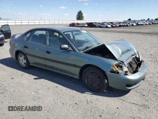 2002 Subaru Legacy L with VIN 4S3BE635526206144, listed as a Copart auction lot 64995045 with 172,886 mi miles and Salvage title. Bid and sale history available at DreamBid. Image 4.