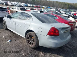 2007 Pontiac Grand Prix z VIN 2G2WP552871118880, wystawiony jako IAAI lot #41576538 z przebiegiem 168 972 mil mil oraz . Historia ofert i sprzedaży dostępna na DreamBid. Obrazek 3.