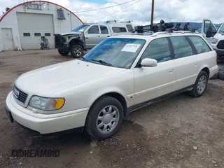 1996 Audi A6 z VIN WAUJA84A9TN106938, wystawiony jako IAAI lot #42287751 z przebiegiem 163 427 mil mil oraz . Historia ofert i sprzedaży dostępna na DreamBid. Obrazek 2.