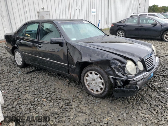 1999 Mercedes-Benz E-Class with VIN WDBJF65H4XA883351, listed as a Copart auction lot 73682964 with 156,446 mi miles and Salvage Title. Bid and sale history available at carsss.com. Image 4.