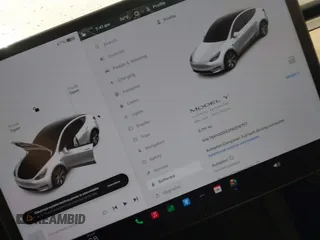 2023 Tesla Model Y Long Range with VIN 7SAYGDEE3PA206757, listed as a IAAI auction lot 39425483 with 5,711 mi miles and . Bid and sale history available at DreamBid. Image 7.