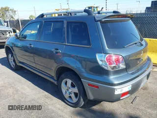 2004 Mitsubishi Outlander SE with VIN JA4LX41F74U035064, listed as a IAAI auction lot 40826249 with 274,046 mi miles. Bid and sale history available at carsss.com. Image 3.
