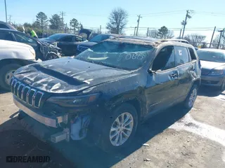 2020 Jeep Cherokee Latitude with VIN 1C4PJLCB1LD525088, listed as a IAAI auction lot 41364826 with 68,127 mi miles. Bid and sale history available at carsss.com. Image 2.