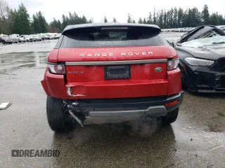 2014 Land Rover Range Rover Evoque Pure Plus with VIN SALVP1BG1EH930475, listed as a Copart auction lot 86645614 with 74,369 mi miles and Salvage title. Bid and sale history available at DreamBid. Image 6.