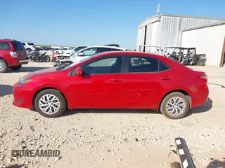 2018 Toyota Corolla L z VIN 5YFBURHE9JP790181, wystawiony jako IAAI lot #41982399 z przebiegiem 79 536 mil mil oraz . Historia ofert i sprzedaży dostępna na DreamBid. Obrazek 14.
