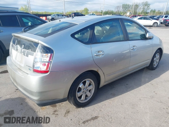 2004 Toyota Prius with VIN JTDKB20U940020058, listed as a IAAI auction lot 42142257 with 141,705 mi miles. Bid and sale history available at carsss.com. Image 4.