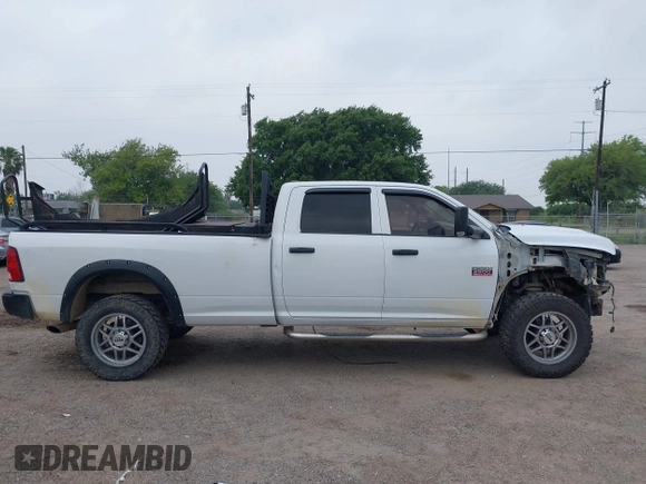 2012 Ram 2500 ST z VIN 3C6UD5HL7CG151684, wystawiony jako IAAI lot #42254751 z przebiegiem 205 423 mil mil oraz . Historia ofert i sprzedaży dostępna na DreamBid. Obrazek 14.