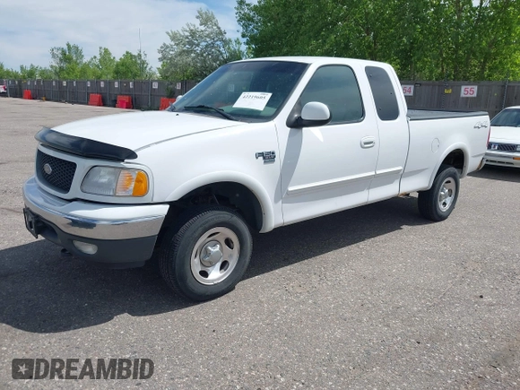 2001 Ford F-150 XL z VIN 1FTRX18W31KF80478, wystawiony jako IAAI lot #42219605 z przebiegiem 127 284 mil mil oraz . Historia ofert i sprzedaży dostępna na DreamBid. Obrazek 2.