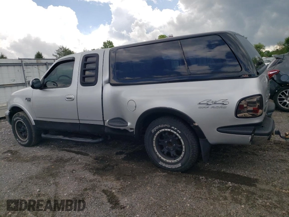 2000 Ford F-150 XL with VIN 2FTRX08L2YCA22507, listed as a Copart auction lot 55390075 with 197,785 mi miles and Salvage title. Bid and sale history available at DreamBid. Image 2.