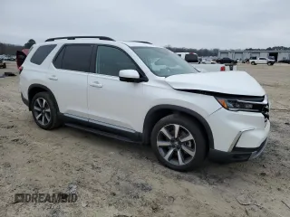 2025 Honda Pilot Elite with VIN 5FNYG1H82SB058680, listed as a Copart auction lot 42996425 with 9,890 mi miles and Salvage Title. Bid and sale history available at DreamBid. Image 4.