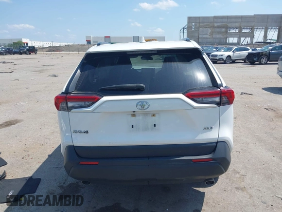 2021 Toyota RAV4 XLE with VIN JTMW1RFV2MD063839, listed as a IAAI auction lot 42406891 with 69,490 mi miles and . Bid and sale history available at DreamBid. Image 16.