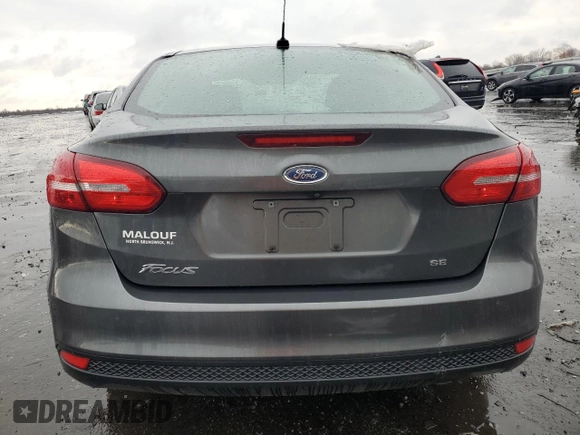 2016 Ford Focus SE with VIN 1FADP3F26GL354210, listed as a Copart auction lot 50378885 with 9,617 mi miles and Salvage Title. Bid and sale history available at DreamBid. Image 6.