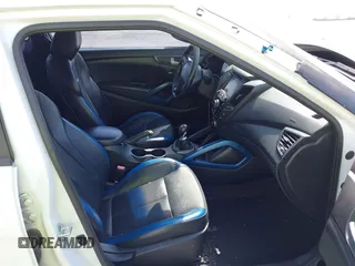 2013 Hyundai Veloster Turbo z VIN KMHTC6AE6DU112233, wystawiony jako IAAI lot #42295962 z przebiegiem 151 091 mil mil oraz . Historia ofert i sprzedaży dostępna na DreamBid. Obrazek 5.
