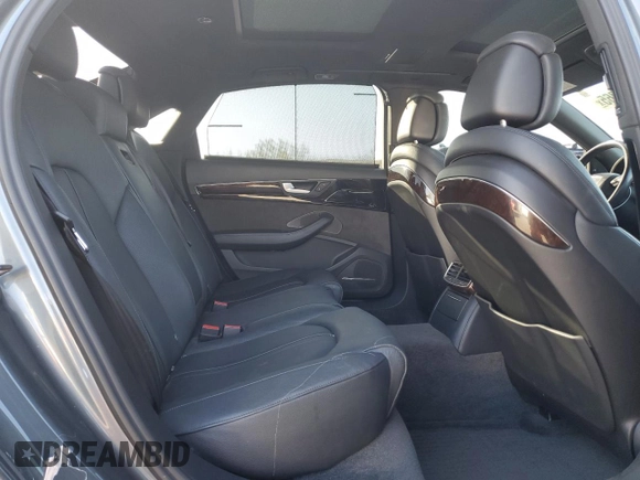 2017 Audi A8 z VIN WAU44AFD0HN010187, wystawiony jako Copart lot #54186365 z przebiegiem 78 095 mil mil oraz Szkody całkowita. Historia ofert i sprzedaży dostępna na DreamBid. Obrazek 10.