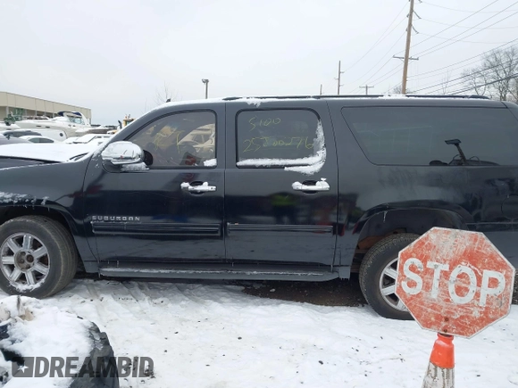 2010 Chevrolet Suburban LS with VIN 1GNUKHE37AR203811, listed as a IAAI auction lot 41304431 with Not provided miles and . Bid and sale history available at DreamBid. Image 13.
