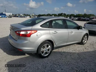 2013 Ford Focus SE with VIN 1FADP3F25DL212152, listed as a Copart auction lot 63040585 with 180,315 mi miles and Clean title. Bid and sale history available at DreamBid. Image 3.