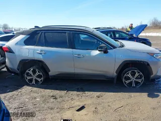 2021 Toyota RAV4 Prime XSE with VIN JTMFB3FV6MD069556, listed as a IAAI auction lot 41740590 with 15,720 mi miles. Bid and sale history available at carsss.com. Image 6.