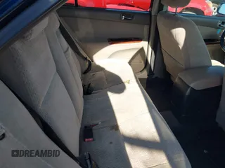 2003 Toyota Camry LE with VIN JTDBE32K930144631, listed as a IAAI auction lot 41994259 with 196,898 mi miles and . Bid and sale history available at DreamBid. Image 8.