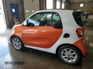2018 Smart fortwo Pure with VIN WMEFJ9BA6JK270276, listed as a Copart auction lot 64037285 with 47,377 mi miles and Clean title. Bid and sale history available at DreamBid. Image 2.