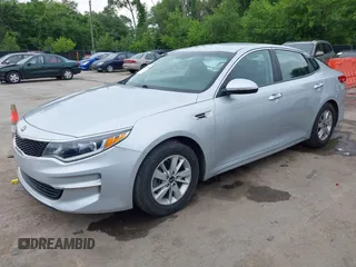 2017 Kia Optima LX with VIN KNAGT4L37H5157247, listed as a IAAI auction lot 42497025 with 154,721 mi miles and . Bid and sale history available at DreamBid. Image 2.