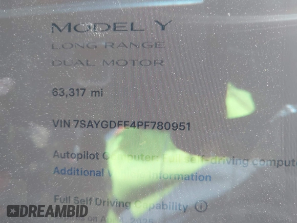 2023 Tesla Model Y Long Range with VIN 7SAYGDEE4PF780951, listed as a IAAI auction lot 41856461 with 63,317 mi miles. Bid and sale history available at carsss.com. Image 7.