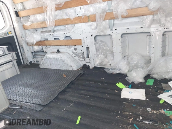 2015 Ford Transit Cargo with VIN 1FTNR1ZM0FKB02483, listed as a IAAI auction lot 41547400 with 317,720 mi miles and . Bid and sale history available at DreamBid. Image 7.