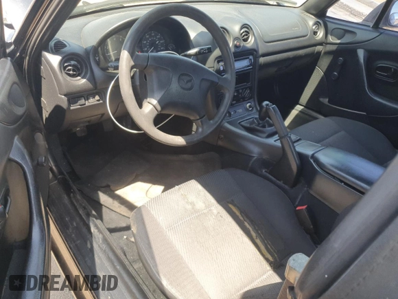 1999 Mazda MX-5 Miata with VIN JM1NB3535X0119662, listed as a Copart auction lot 61870445 with 84,787 mi miles and Clean title. Bid and sale history available at DreamBid. Image 8.