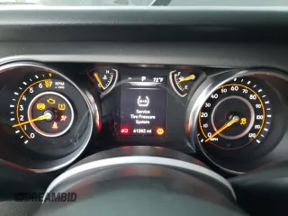 2022 Jeep Wrangler Unlimited High Tide with VIN 1C4HJXDG1NW134486, listed as a Copart auction lot 75280764 with 61,282 mi miles and Salvage Title. Bid and sale history available at DreamBid. Image 9.