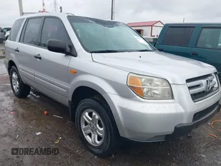 2007 Honda Pilot LX with VIN 2HKYF18157H530370, listed as a IAAI auction lot 41967033 with 214,590 mi miles and . Bid and sale history available at carsss.com. Image 1.
